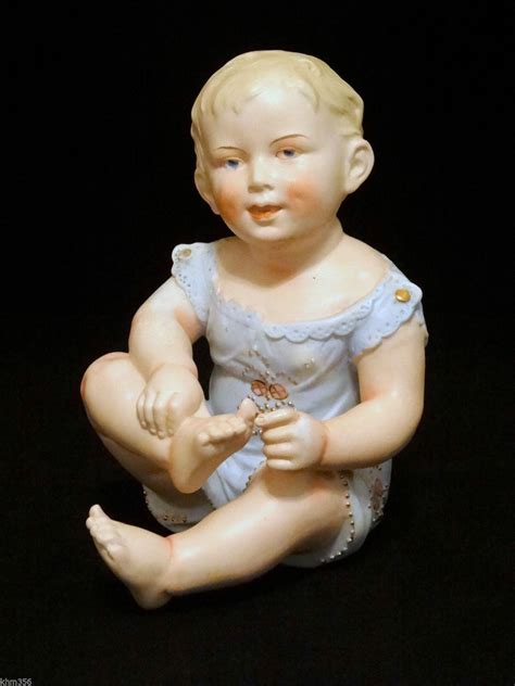 Antique German Bisque Porcelain Piano Baby Little Baby Boy Figurine in