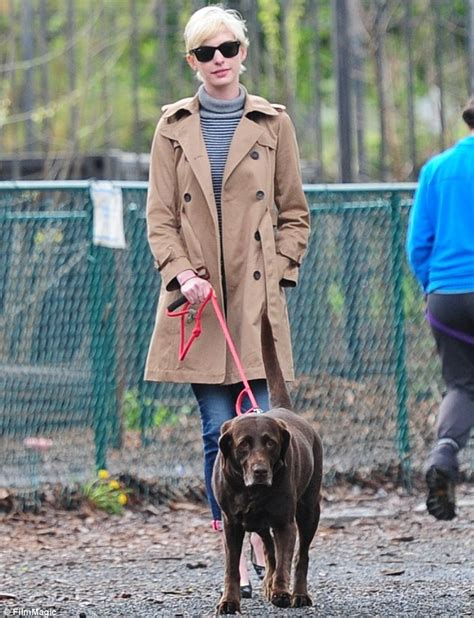 Anne Hathaway Is In Stark Contrast To Her Chocolate Labrador During