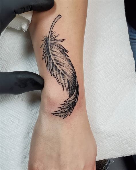 Amazing Feather Tattoo Designs You Need To See Outsons