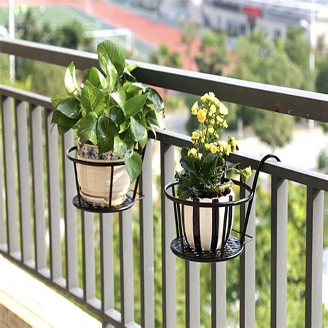 If you've scheduled to have a new fence installed on your property, you probably feel a strong sense of anticipation if you have movable lawn furniture, flower pots, children's play equipment, and other decorative items in your yard, it's best to relocate them to a. The Rail Fence Flower Planters Holder (With images) | Flower planters, Planters, Garden gadgets