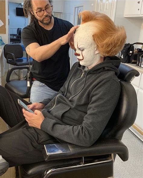 Bill Skarsgård in the makeup chair being transformed into Pennywise for IT Bill skarsgard