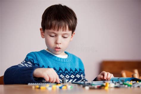 Five Years Old Boy Playing With Building Blocks Stock Photo Image Of