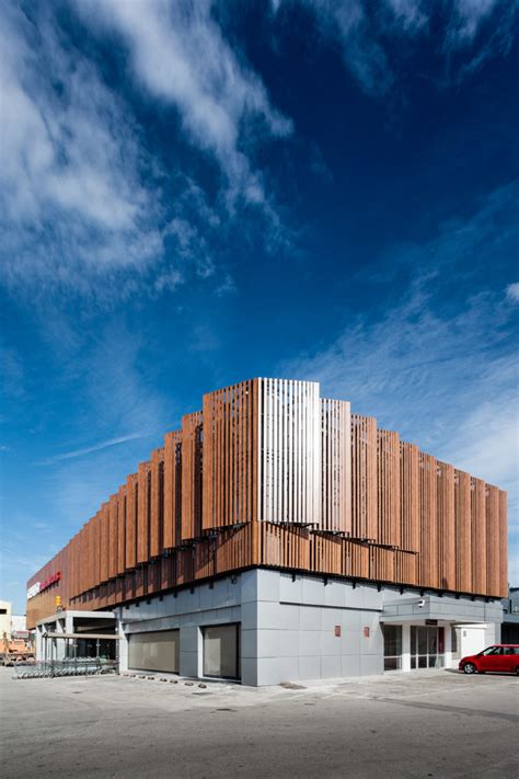 Striking Louvered Facade Controls Solar Gain And Updates