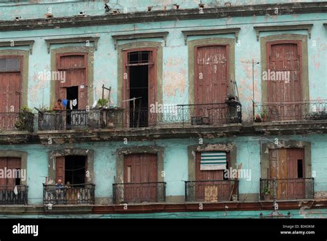 Typical Apartment Building In Havana Cuba With Balconies And Derelict