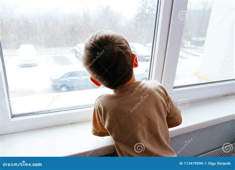 The Boy Looks Out The Window Stock Photo Image Of Face Abuse 113479090