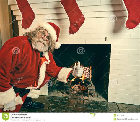Bad Santa Burning Ts In The Fireplace Stock Photo Image Of Adult