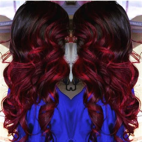 The positioning of the highlights creates a unique color band around the head. Brunette hair with bright red highlights Long curly ...