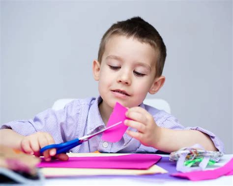 Boy Playing With Blocks In Classroom Stock Photo By ©simplefoto 27268205