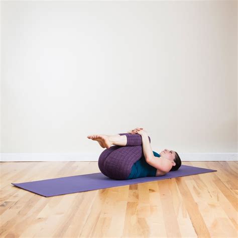 Knees To Chest Yoga Poses You Can Do In Bed Popsugar Fitness Photo