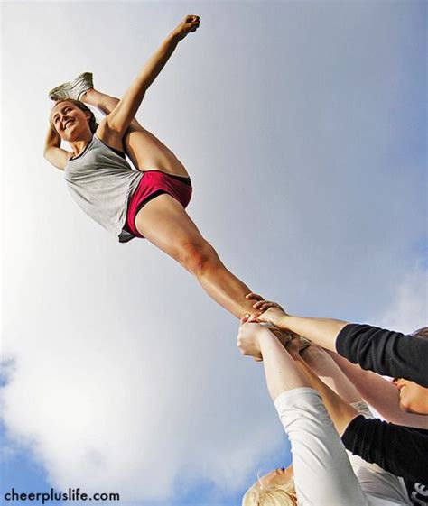 bow and arrow lift cheerleading photos cheer poses cheer picture poses