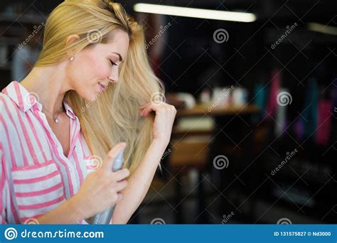 Woman Fixes Her Hair With A Hairspray Stock Image Image Of Blond Care