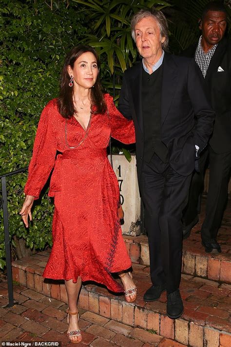 Paul Mccartneys Wife Nancy Shevell 60 Dazzles In A Scarlet Wrap Dress On Dinner Date Daily