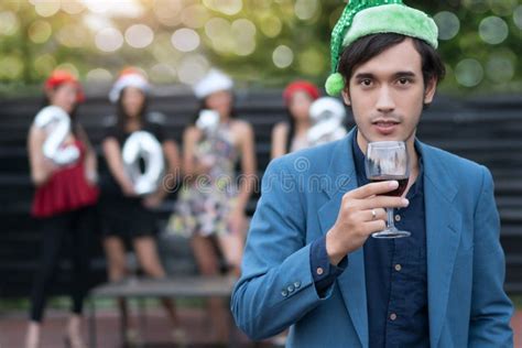 Handsome Man Wearing Santa`s Hats With Holding Glass Of Wine At Stock Image Image Of Beauty