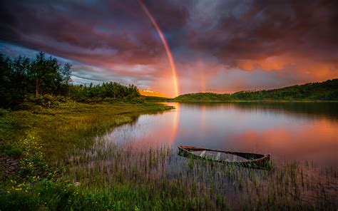 Sunset Rainbow After Rain Lake Boat Forest Trees Sky With Red Clouds