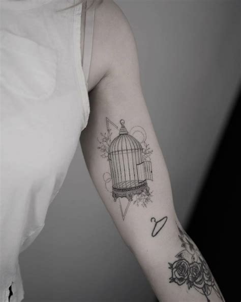 Single Needle Bird Cage Tattoo