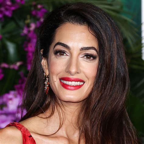 Amal Clooney Is Stylish As Ever In A Crisp White Minidress Bejeweled Coat And Perfect Mary