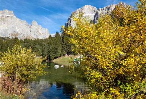 Autumn Alpine Dolomites Rocky Mountain And Small Lake Scene Sudtirol