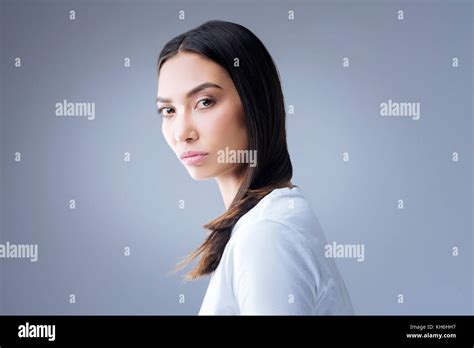 Young Mysterious Woman Turning While Walking Stock Photo Alamy