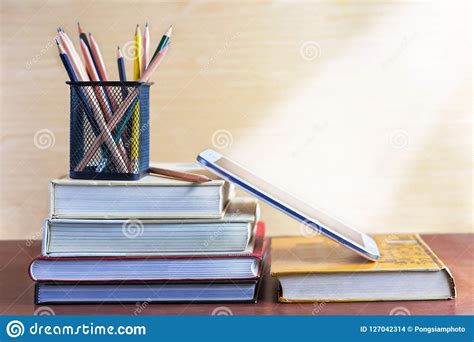 Textbook Pencil And Notepad On The Table The Concept Of Combining
