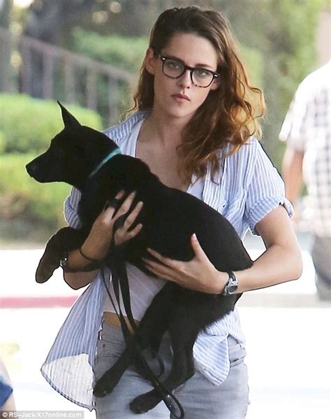 Kristen Stewart Cradles Adorable Black Pup For Solo Lunch Outing