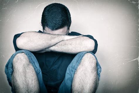 Sad Youg Man Sitting On The Floor Crying Stock Image Image Of Despair