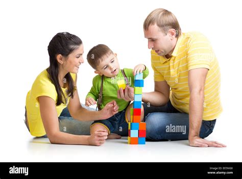 Kid With His Parents Playing Building Blocks Stock Photo Alamy