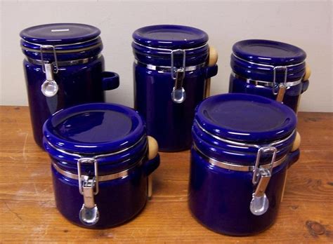 These stylish containers, with their embossed, delicately curved line pattern and bamboo lid, are ideal for storing dry food. www.M37Auction.com: OGGI Cobalt Blue Canister Set | Blue ...