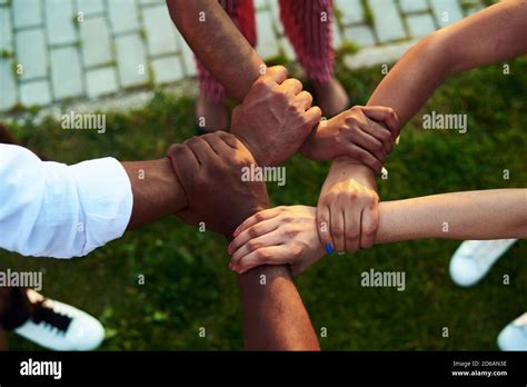 Black People With Hands Joined Group Of People Stacking Hands Together