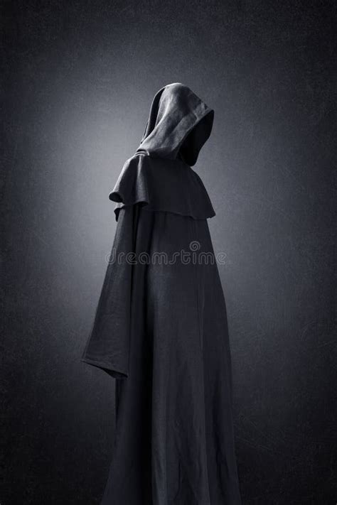 Scary Figure With Hooded Cloak In The Dark Stock Photo Image Of