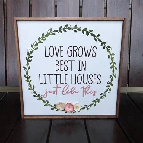 Love Grows Best In Little Houses Just Like This Painted Wood Sign Is
