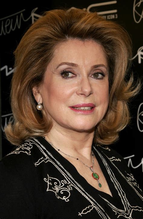 Sexiest haircut for women over 70. Catherine Deneuve - Long layered hairstyle for a 60 plus woman