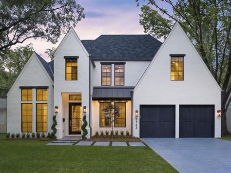 Tudor homes have some great architectural features that we're sure you'll love. Modern Spanish Tudor | Modern farmhouse exterior, House ...