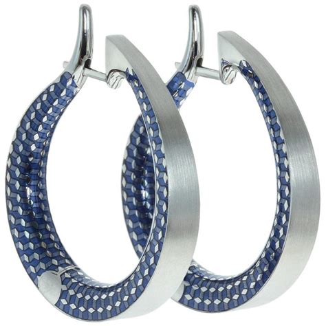 Hoop earrings are a timeless piece and an everyday staple regardless of their shape and size. 18 Karat White Gold Kaleidoscope Enamel Hoop Earrings For Sale at 1stdibs