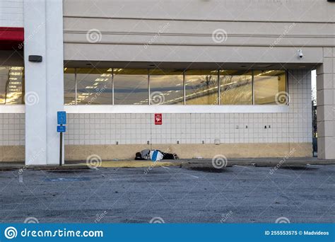 Close Up Homeless Person Sleeping On A Sidewalk Closed Building Stock Image Image Of Outdoors