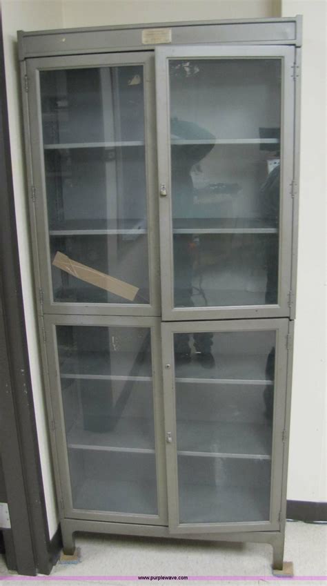 Metal Cabinet With Glass Doors In Manhattan Ks Item 5217 Sold Purple Wave