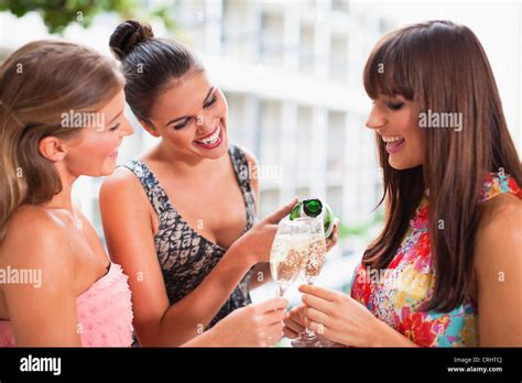 Women Drinking Champagne Together Stock Photo Alamy