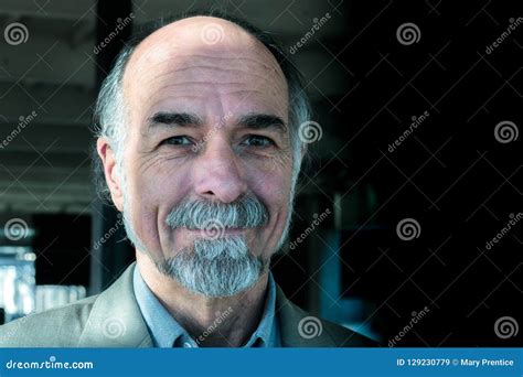 Sexy Charming Attractive Senior Adult Male In 60s Smiling At Camera
