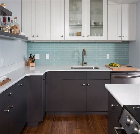Darker colors near the ceiling can make the ceiling seem lower than it actually is, especially if you. Hot new colors blend well with gray | Blue backsplash ...