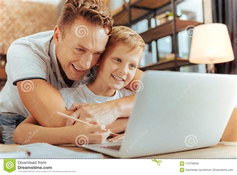Joyful Caring Man Hugging His Son Stock Photo Image Of Caucasian