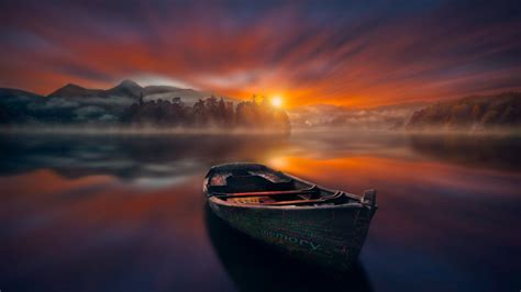 Sunset 4k Wallpaper Boat Lake Reflections Dawn Mountains Fog