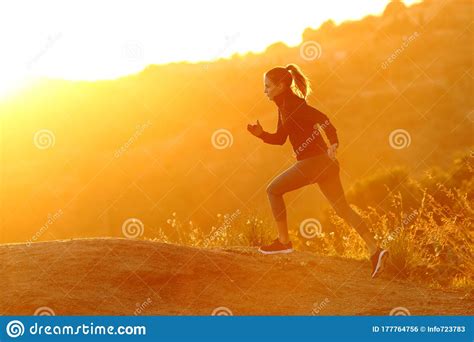 Runner Woman Running In The Mountain At Sunset Stock Photo Image Of