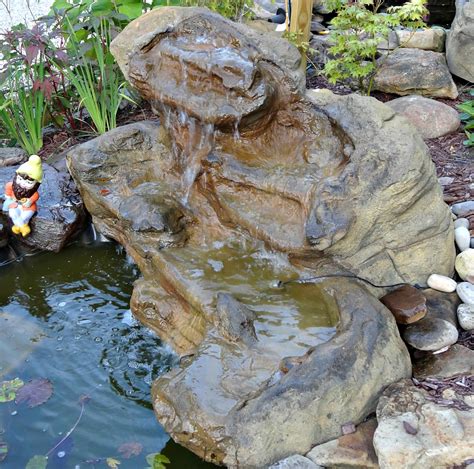 Custom formed from natural boulders and using a durable 25 year polyurea industrial coating. Patio Pond Pool Waterfall Kits & Backyard Water Rock Features