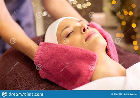 woman having face massage with terry gloves at spa stock image image of beautiful face 136251213