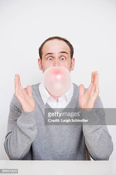 Man Blowing Bubble Gum Photos And Premium High Res Pictures Getty Images