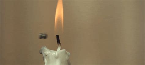 Watch An Air Pistol Pellet Slice The Flame Of A Candle In Slow Motion