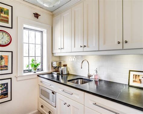 Copper hood and copper handles and accents. White Cabinets Tile Backsplash | Houzz
