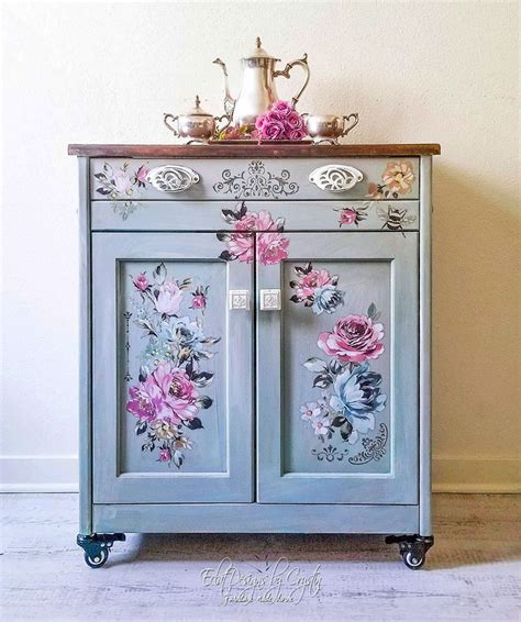 Old and new pieces of rattan furniture sit under its vaulted ceiling. Floral Kitchen Island in GF Key West Blue, Empire Gray and ...