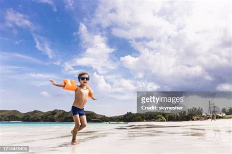 Boy Wearing Armbands Photos And Premium High Res Pictures Getty Images