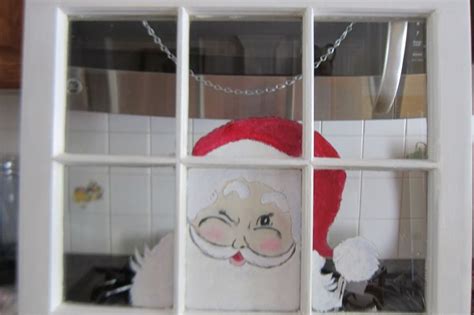 Hand Painted Santa Peeking Thru A Window Shop