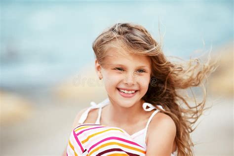 Portrait Of A Pretty Little Girl With Waving In The Wind Long Ha Stock